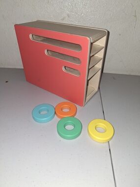 Wooden Stacking Ring Sorter with Coral Panel and Colorful Rings